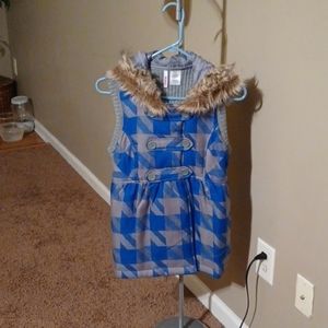 Blue and gray sweater vest with a fury hood